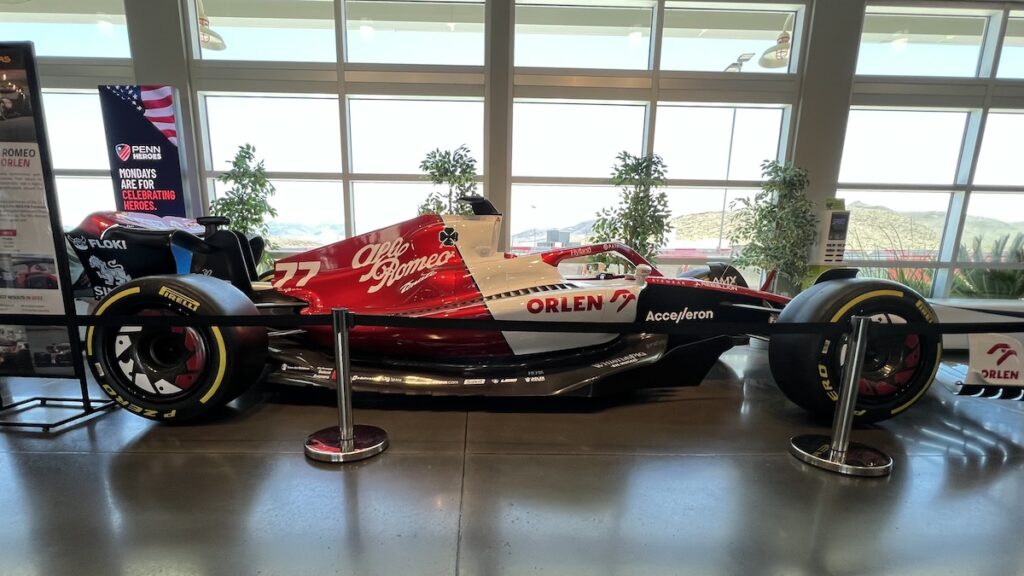 a interior shot photo of a F1 car, inside the SpeedVegas facility. 